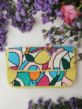 Multicolor Poppy Baguette Bag with handle by The Tan Clan, featuring vibrant woven design and compact, stylish shape.