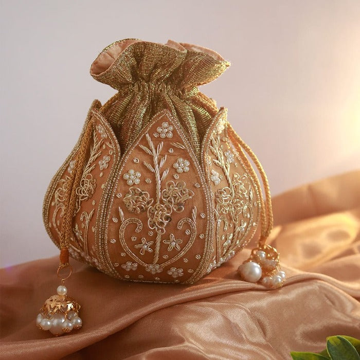 Pushp Zardozi embroidered mini lotus potli bag by The Tan Clan, featuring intricate floral embroidery and traditional design.
