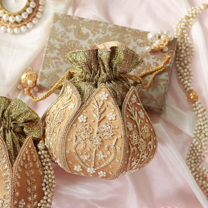 Pushp Zardozi embroidered mini lotus potli bag by The Tan Clan with intricate floral zardozi embroidery and traditional handcrafted design.