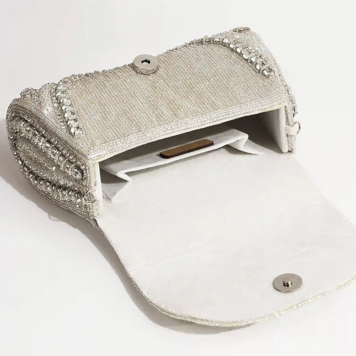 Chloe Flap Over Bag with Handle by The Tan Clan, featuring a sleek design and gold-tone accents.