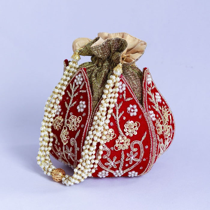 Pushp Zardozi embroidered mini lotus potli bag by The Tan Clan, detailed floral embroidery with traditional Indian craftsmanship.