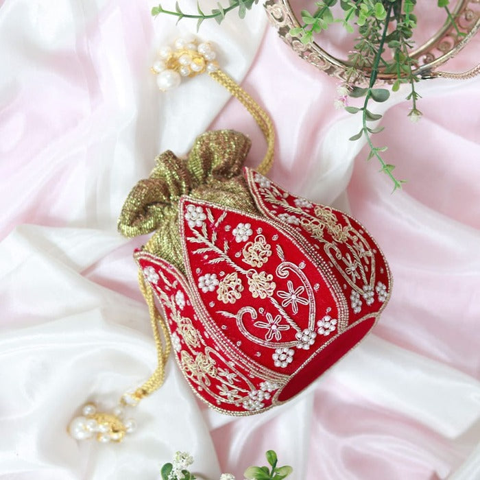 Mini lotus-shaped potli bag from The Tan Clan, featuring intricate Pushp Zardozi embroidery and traditional embellishments.