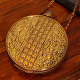 Qurbat embellished brass clutch by The Tan Clan featuring intricate design and elegant craftsmanship for stylish occasions.