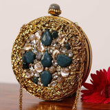 Qurbat embellished brass clutch by The Tan Clan featuring intricate design and elegant craftsmanship.