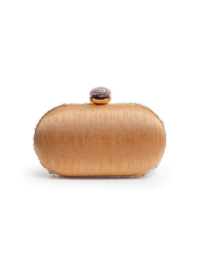 Golden hand-embroidered pearl clutch bag by The Tan Clan featuring intricate embroidery and elegant design.
