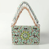 Rainbow-embellished flap-over clutch bag by The Tan Clan with colorful rainbow decorations and sleek design.
