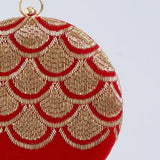 Hand-embroidered Rajwada clutch bag by The Tan Clan with intricate traditional embroidery and a compact design.