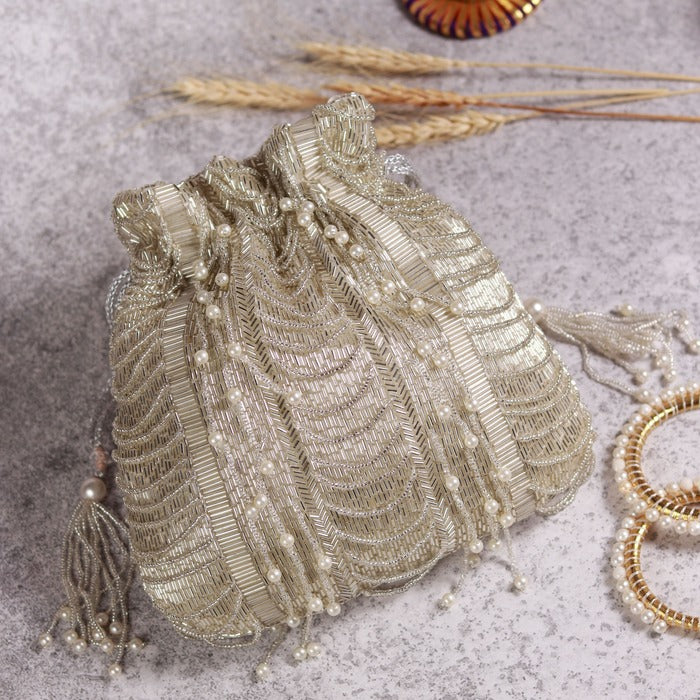 Rangreza Combo: Keisha black tassel potli and Sharda silver potli bag with intricate designs, stylish traditional accessories.