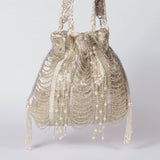 Black tassel potli bag with embroidery and silver potli bag with intricate designs, stylish accessories from THE TAN CLAN.