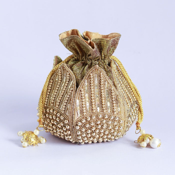 Hand embroidered mini lotus potli bag by The Tan Clan featuring intricate embroidery and a compact, stylish design.