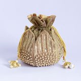 Hand embroidered mini lotus potli bag by The Tan Clan featuring intricate embroidery and a compact, stylish design.