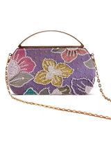 Riveria multicolor capsule clutch by The Tan Clan featuring vibrant, multicolor design and compact, stylish accessory for on-the-go use.