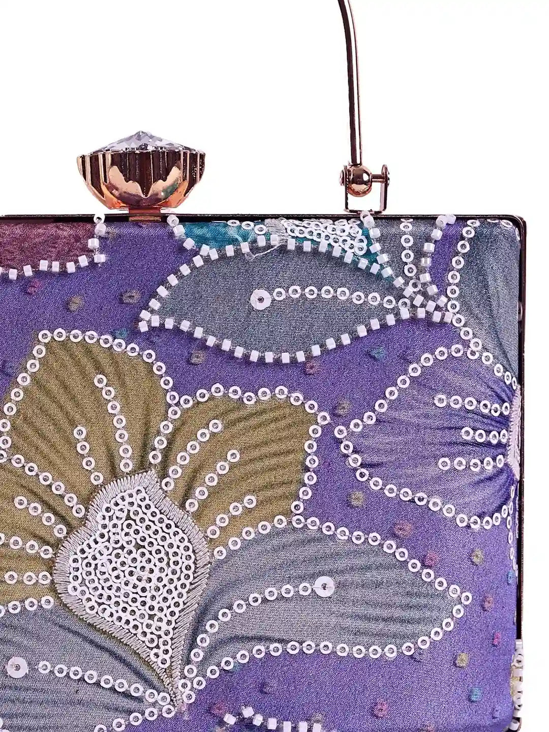 Riveria multicolor casket clutch by The Tan Clan featuring vibrant multicolor design and elegant rectangular shape.