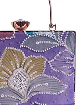 Riveria multicolor casket clutch by The Tan Clan featuring vibrant multicolor design and elegant rectangular shape.
