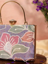 Riveria Multicolor Casket Clutch by The Tan Clan featuring vibrant multicolor design and elegant metal frame.