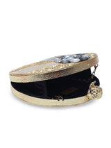 Roma Round Embellished Mother of Pearl Clutch by The Tan Clan, featuring a round shape with decorative embellishments and mother of pearl finish.