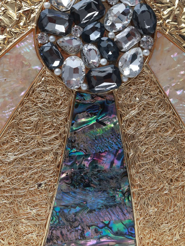 Roma round embellished mother of pearl clutch by The Tan Clan, featuring a shiny, decorative pearl design and compact, elegant shape.