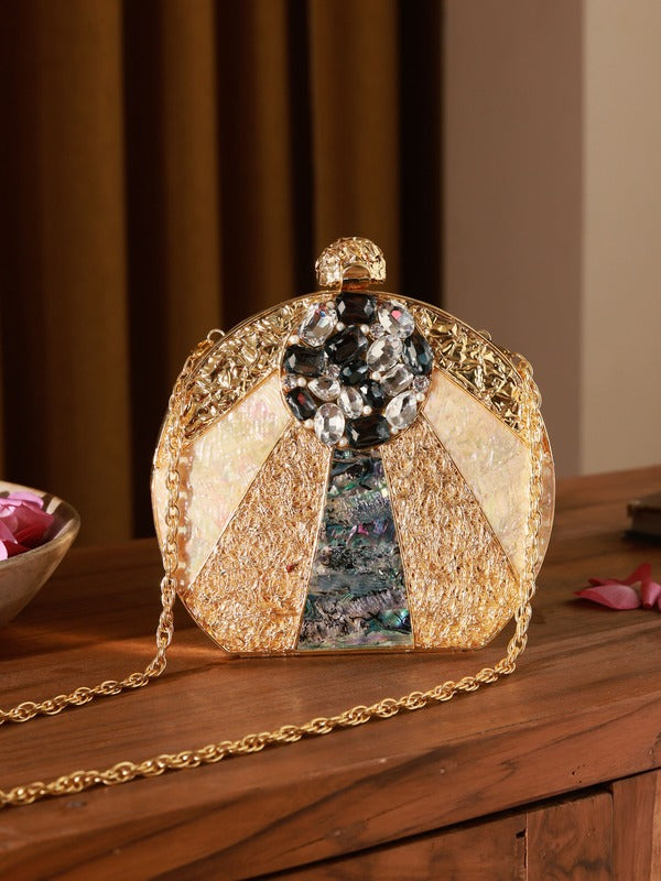 Roma Round Embellished Mother of Pearl Clutch by The Tan Clan, featuring a shiny, round design with decorative pearl accents.
