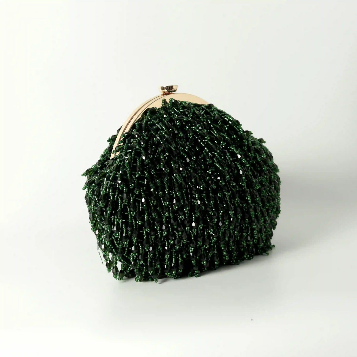Emerald Rosa Batua Bag by The Tan Clan with a detachable handle, showcasing stylish and versatile design.