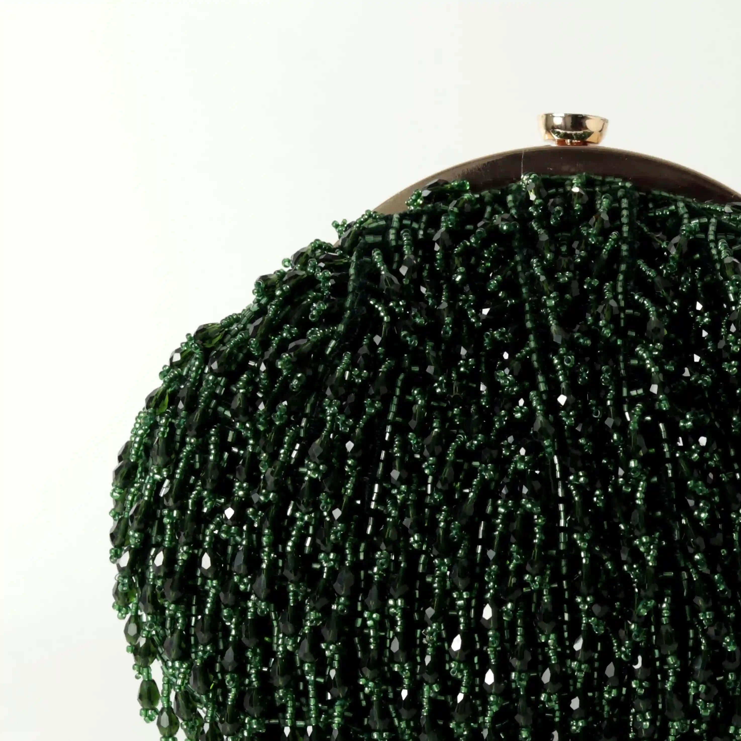 Emerald Rosa Batua Bag with detachable handle by The Tan Clan, featuring a stylish, versatile design and premium craftsmanship.