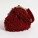 Red Rosa Batua Bag with Detachable Handle by The Tan Clan, featuring a stylish design and versatile strap for everyday use.