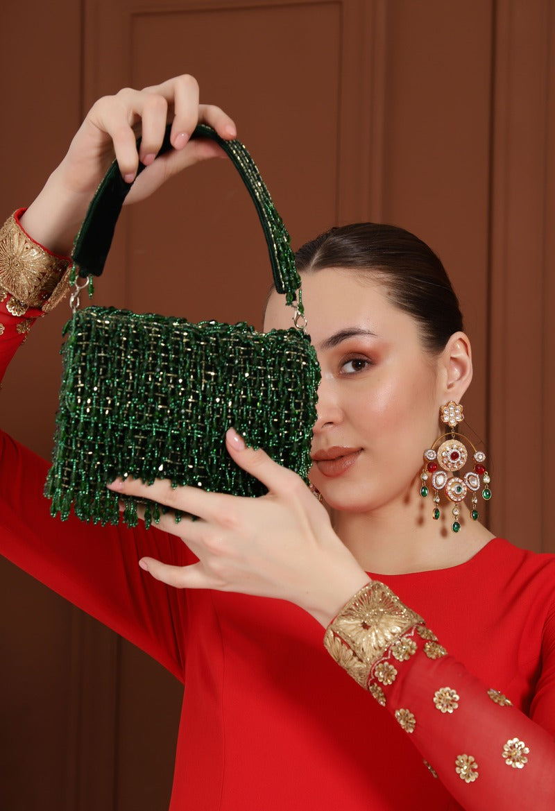 Rosa beaded flap-over clutch bag by The Tan Clan featuring emerald beads and elegant design.