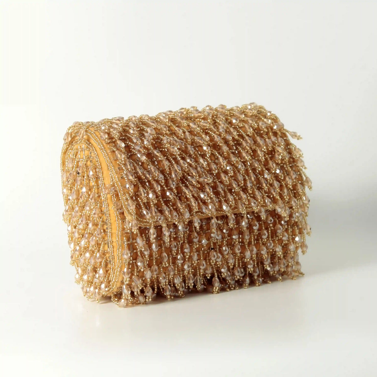 Rosa beaded flap-over clutch bag by The Tan Clan with intricate beadwork and elegant design for evening occasions.