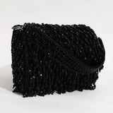 Rosa beaded flap-over clutch bag by The Tan Clan with intricate beadwork and elegant design, perfect for evening occasions.