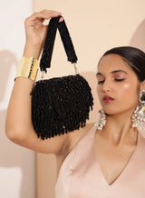 Rosa beaded flap-over clutch bag by The Tan Clan with intricate beadwork and a stylish design for evening accessories.