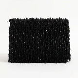 Beaded Rosa flap-over clutch bag by The Tan Clan with intricate beaded detailing and compact design for evening use.