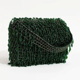 Rosa beaded flap-over clutch bag by The Tan Clan with intricate beading and a sleek design for elegant occasions.