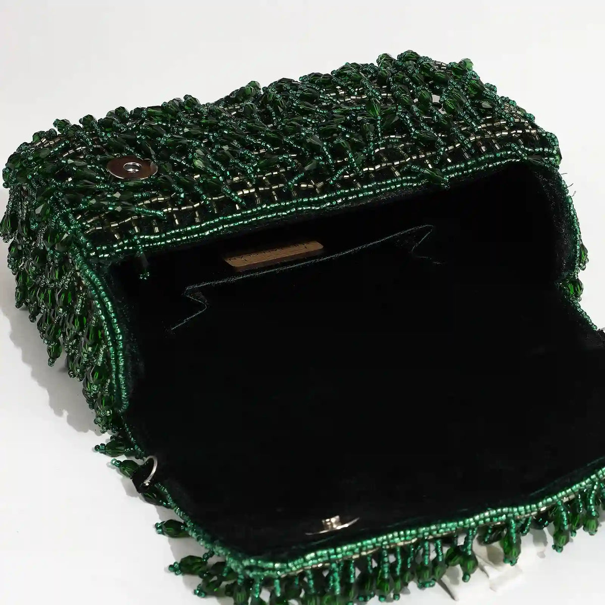 Rosa beaded flap-over clutch bag by The Tan Clan with intricate beadwork and elegant design for evening occasions.