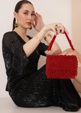 Rosa beaded flap-over clutch bag by The Tan Clan with intricate beadwork and elegant design for evening occasions.