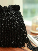 Rosa black Potli bag with handle from The Tan Clan, featuring a traditional drawstring closure and elegant design.