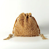 Rosa Potli Bag with Handle by The Tan Clan, featuring soft pink fabric and traditional drawstring closure.