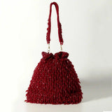 Red Rosa Potli bag with handle by The Tan Clan, featuring traditional design and vibrant color for stylish occasion use.