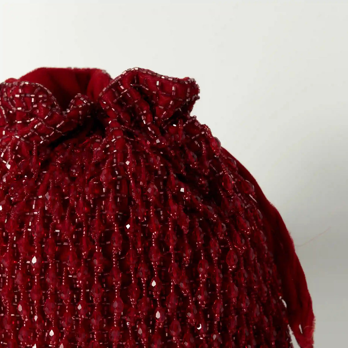 Red Rosa Potli Bag with Handle by The Tan Clan, featuring traditional design and compact size for stylish carrying.