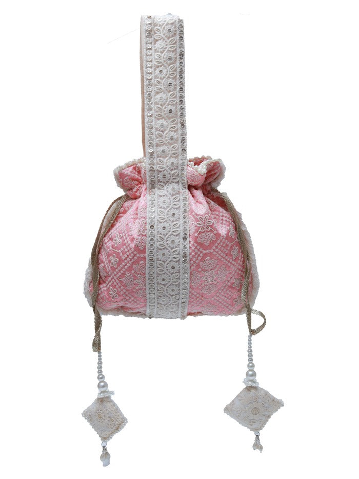 Pink Ruhi Potli Bag with handle from The Tan Clan, featuring traditional design and elegant embroidery.