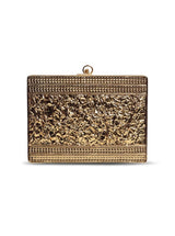 Elegant brass clutch with intricate embellishments from The Tan Clan, featuring a sleek design and decorative details.