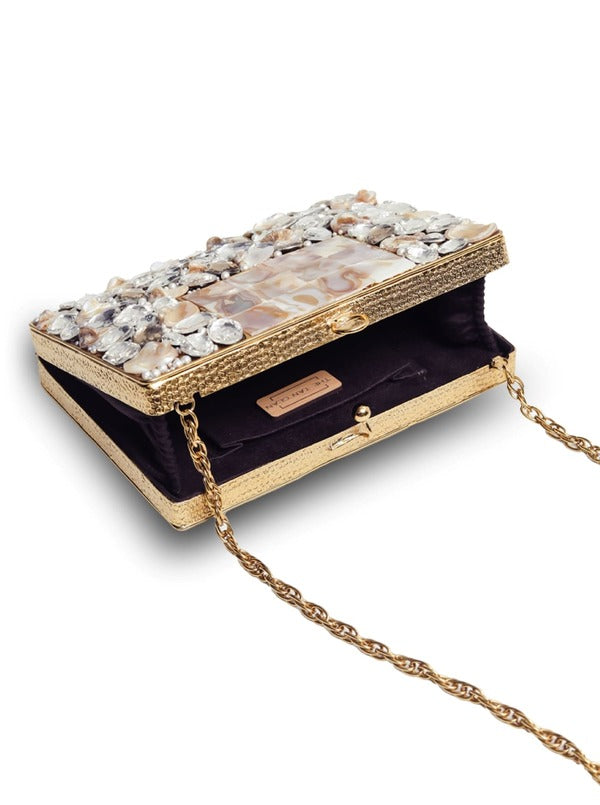 Saba embellished brass clutch bag with intricate detailing and a sleek design, crafted by The Tan Clan.