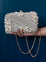 Saliha hand-embroidered clutch bag by The Tan Clan featuring intricate embroidery and compact design.