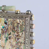 Salma Mother of Pearl Clutch by The Tan Clan showing a stylish clutch with iridescent mother of pearl surface and elegant design.