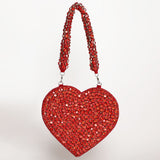 Scarlett Mini Heart Bag by The Tan Clan, stylish compact bag with a heart-shaped design and adjustable strap.