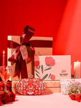 Self-care gift set featuring Elizah oval clutch and Nathabit products, displayed in an elegant set of six by THE TAN CLAN.
