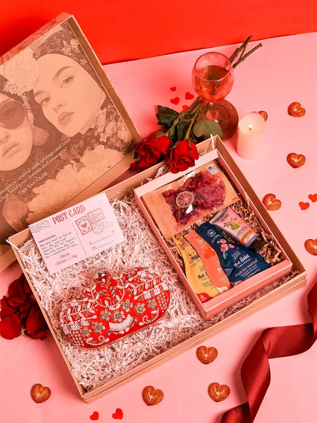 Self-care gift set featuring Elizah oval clutch and Nathabit products from THE TAN CLAN, set of 6, displayed with accessories.