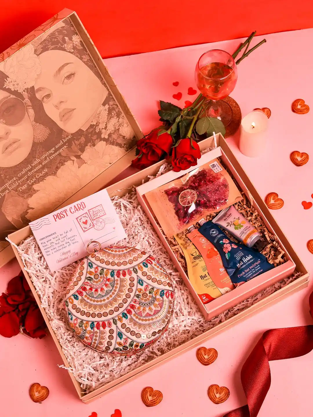Set of six THE TAN CLAN self-care gift sets featuring Jashn round clutch and Nathabit accessories, stylish and perfect for pampering.