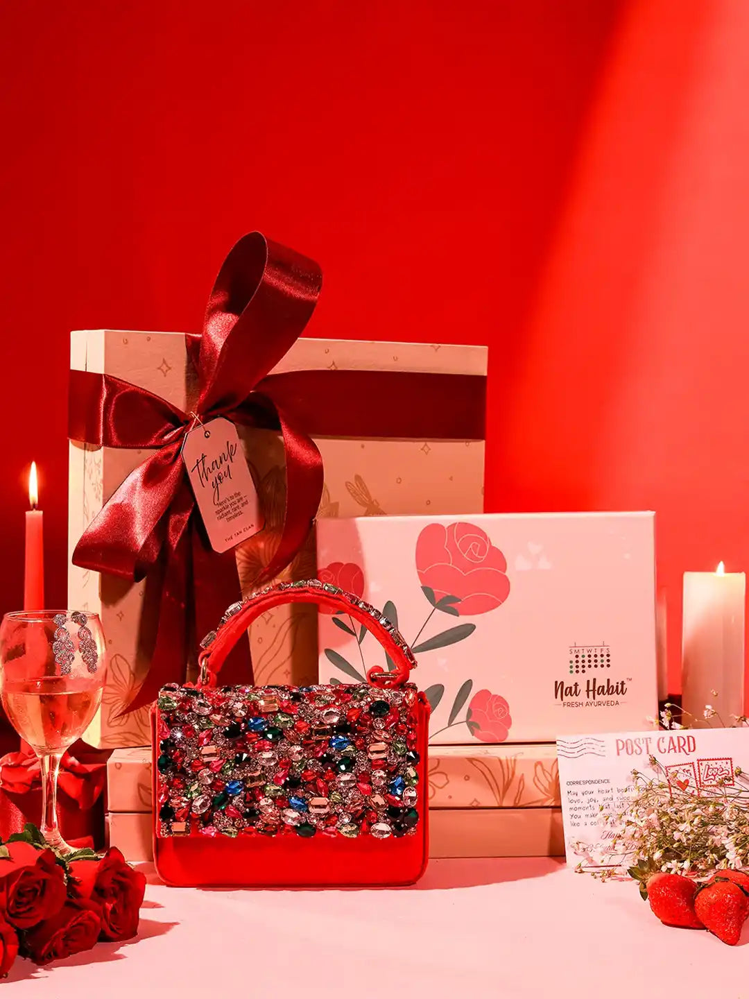 Self-care gift set featuring Kylie flap-over bag and Nathabit products, includes six items in a stylish packaging.