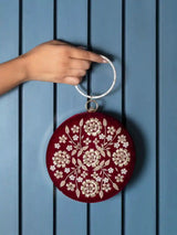 Maroon Shalimar hand-embroidered clutch bag with intricate embroidery by The Tan Clan, featuring a stylish, elegant design.