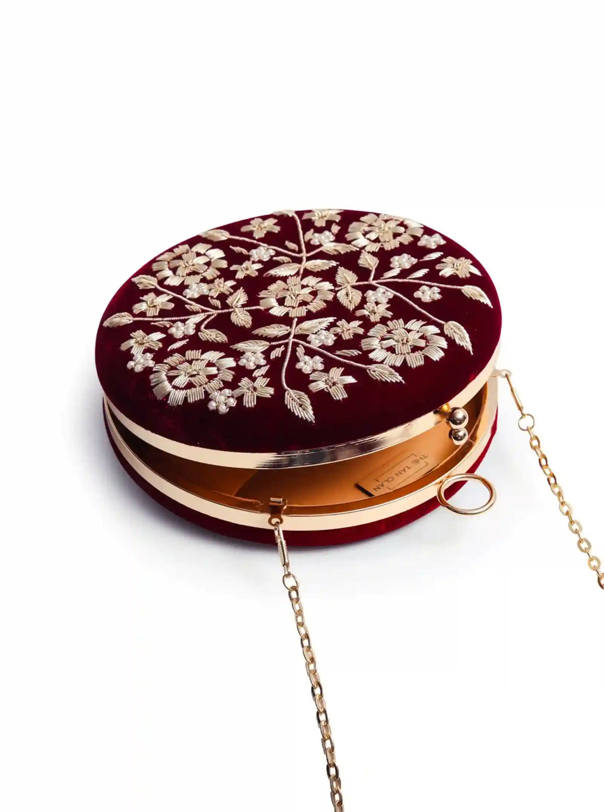Maroon Shalimar clutch by The Tan Clan, hand-embroidered with intricate designs, stylish and elegant for special occasions.