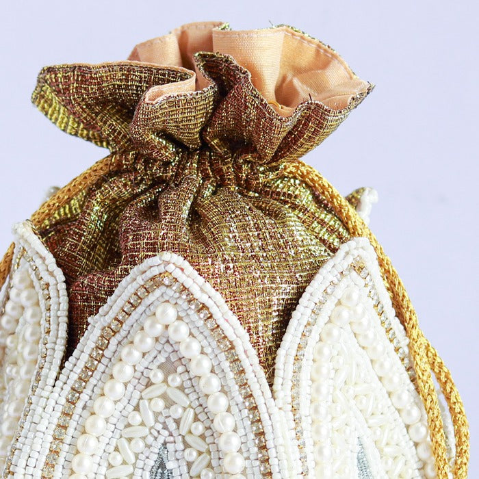 Hand-embroidered mini lotus potli bag from The Tan Clan with intricate floral embroidery and traditional drawstring closure.